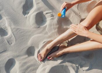 Photo by Photo By: Kaboompics.com: https://www.pexels.com/photo/woman-applying-sunscreen-on-bare-legs-5202466/