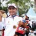 Triyaningsih, atlet Kementerian Pemuda dan Olahraga (Kemenpora) yang turun di kategori usia di bawah 45 tahun, kembali berhasil meraih medali emas pada nomor lari 5 kilometer (5K) di ajang Pekan Olahraga Nasional (Pornas) Korpri XVII Tahun 2025, yang digelar di Palembang, Sumatera Selatan, Sabtu (11/10).(foto:raiky/kemenpora.go.id)